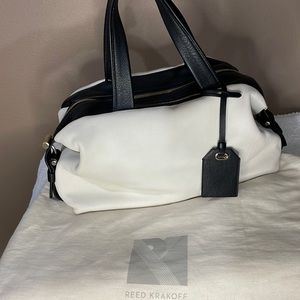 Reed Krakoff, cream with black trim, like new !